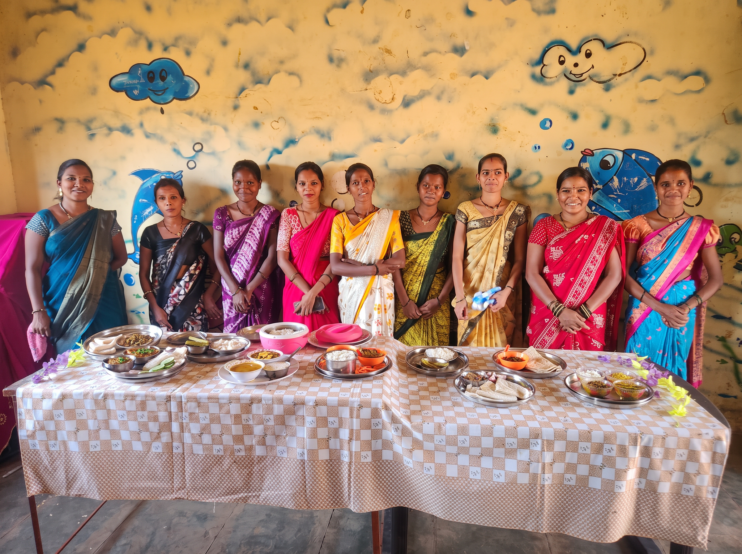 Women of the collective preparing a tribal thali